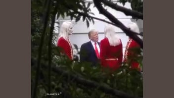 Verificación de Datos: Imágenes FALSAS Muestran a Trump y Otros Líderes Mundiales Reunidos con Alienígenas de Uniformes Rojos -- Ciencia Ficción Generada por IA 